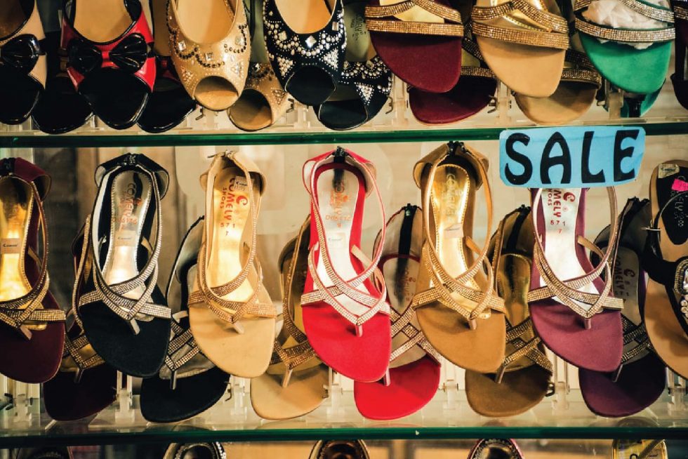 rows of shoes with text 'sale'