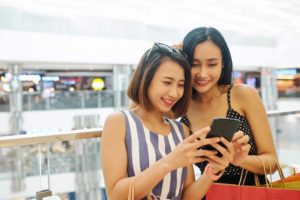 friends looking at a phone