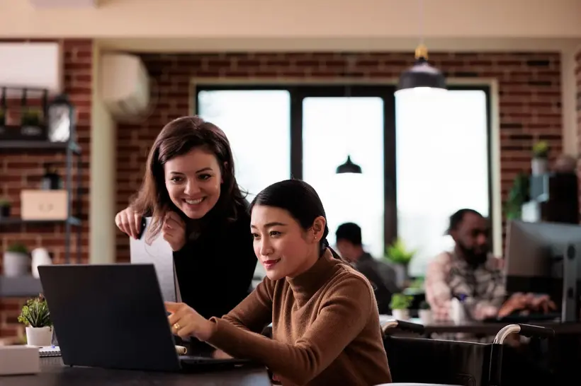 two women having discussion at cafe