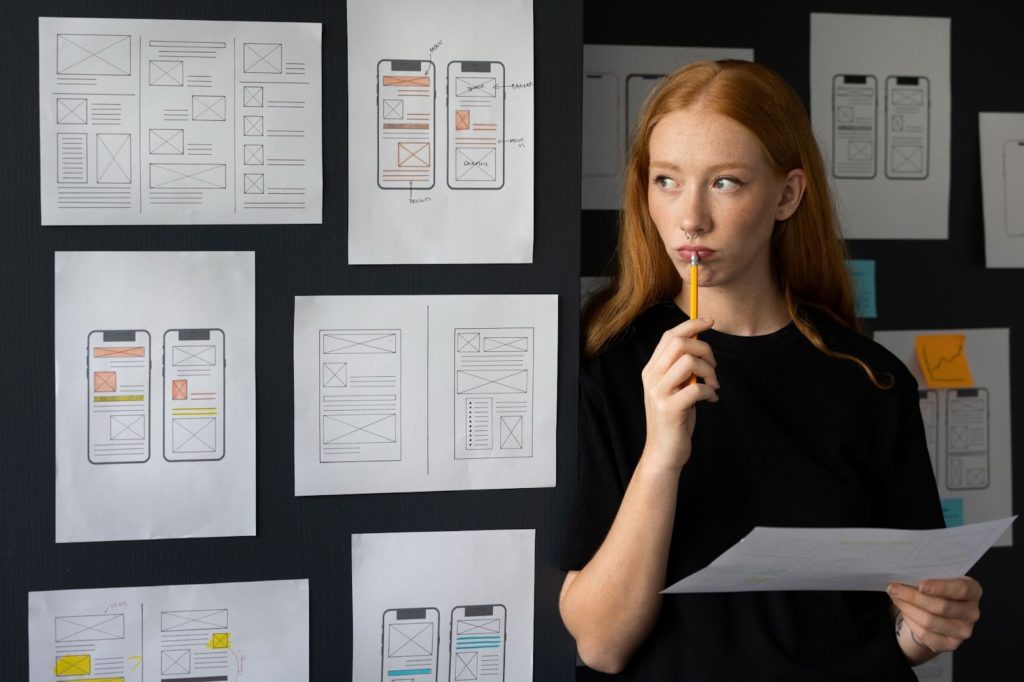 woman thinking about her user experience presentation